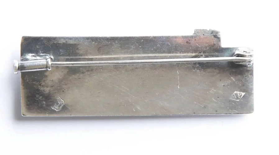 Broche Broche rare en argent martelé de Jean Despres, 1932 58 Facettes
