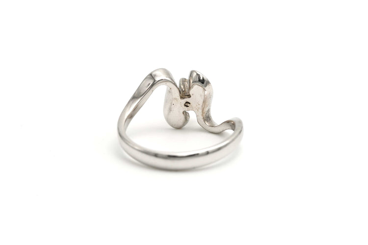 Bague 50 Bague années 70 en or blanc, diamant taille brillant 58 Facettes B711