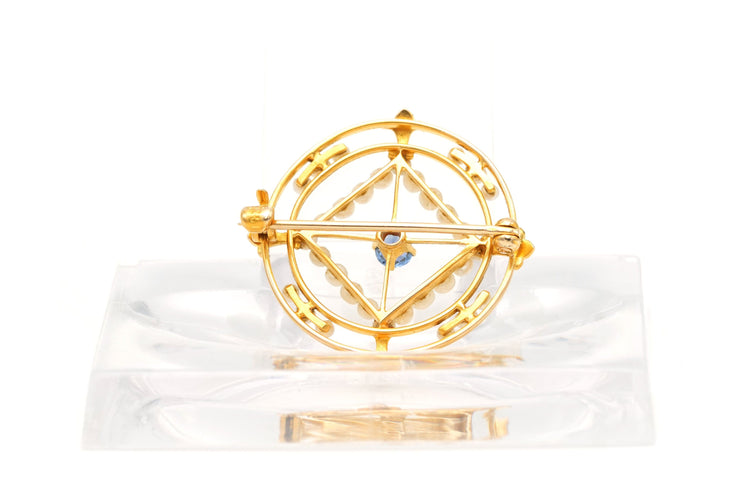 Broche Broche en or jaune sertie d'un saphir et de perles 58 Facettes 22301