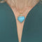 Hanger hart geelgoud en larimar 