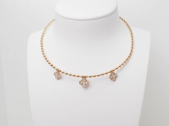 Collier Collier boules rigide et trèfles en or rose et diamants 58 Facettes 33100