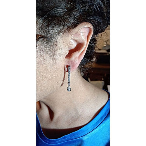 Boucles d'oreilles Boucles d'oreilles pendantes en or blanc avec diamants taille brillant 58 Facettes G3774