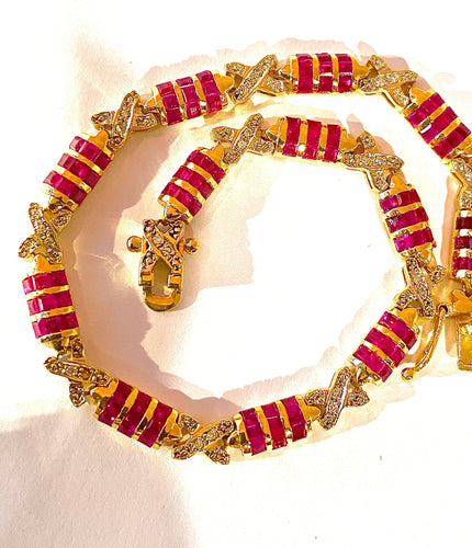 Bracelet Bracelet en or jaune, rubis calibrés et diamants 58 Facettes AB620