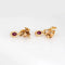 Boucles d'oreilles Boucles d'oreilles pendantes Carrera y Carrera en or jaune 18 carats, rubis et cheval, bijoux signés Estate 58 Facettes G13693