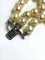 Bracelet Bracelet de perles à trois rangs du XXe siècle 58 Facettes