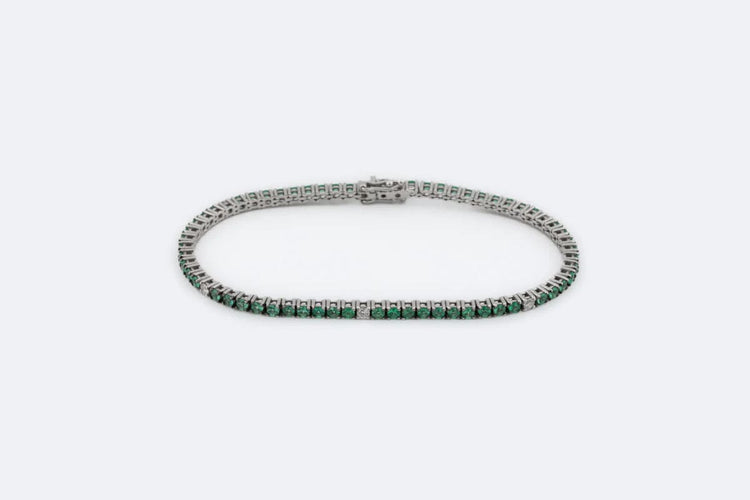 Bracelet Oro Bianco Bracelet de tennis en or blanc orné de pierres semi-précieuses vertes et de diamants 58 Facettes brc254