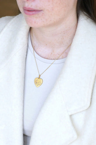 Pendentif Médaillon cœur ouvrant en or, diamants, et perles 58 Facettes