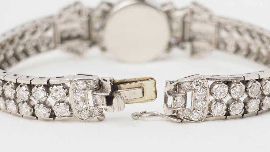 Montre 16cm Montre Ery en or platine et diamants 58 Facettes 32306