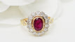 Bague 53 Bague entourage en or jaune, rubis et diamants 58 Facettes 32646