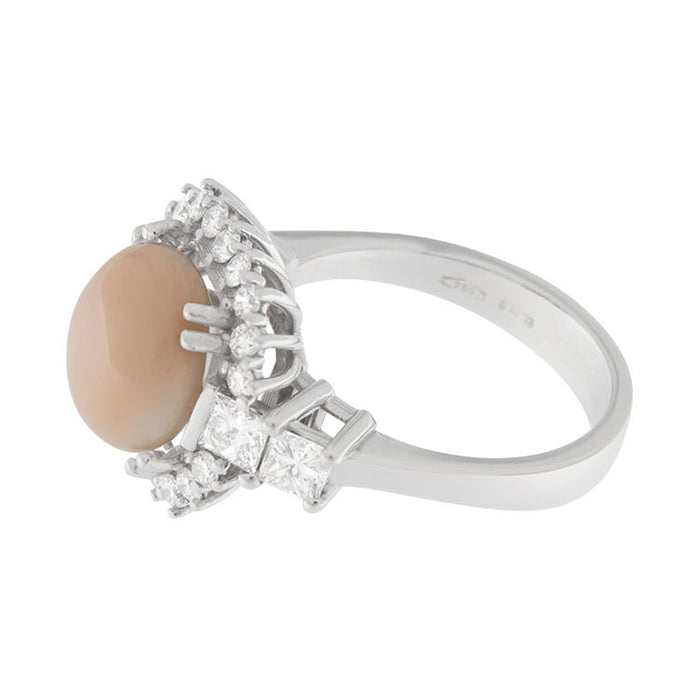 White gold ring with coral and diamonds