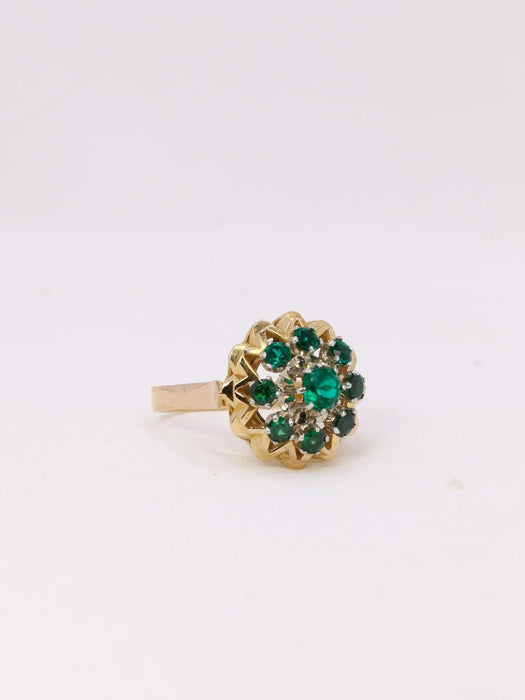 Yellow gold star ring with green stone
