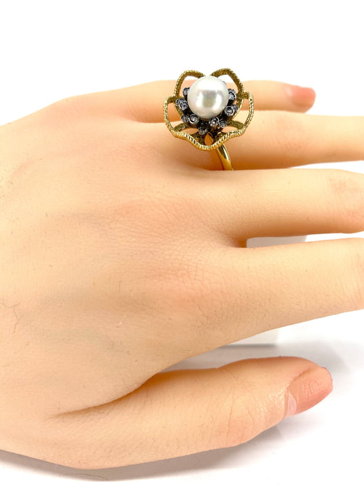 Gouden en zilveren fijne parel- en diamanten ring