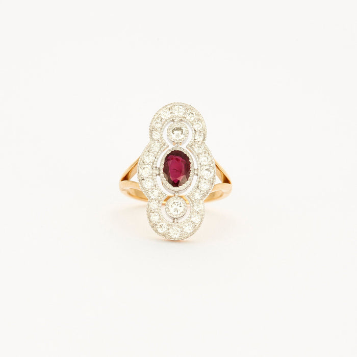 Art Deco Style ring in yellow gold, platinum, diamonds and ruby center