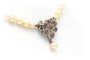 Collier Collier en or blanc, perles et rubis 58 Facettes B278