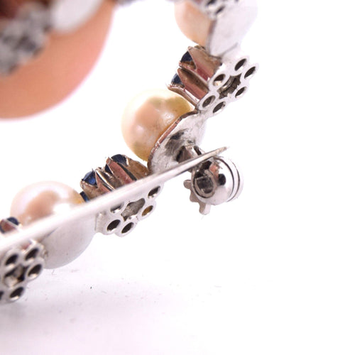Broche Broche en or blanc, perles naturelles et saphirs 58 Facettes