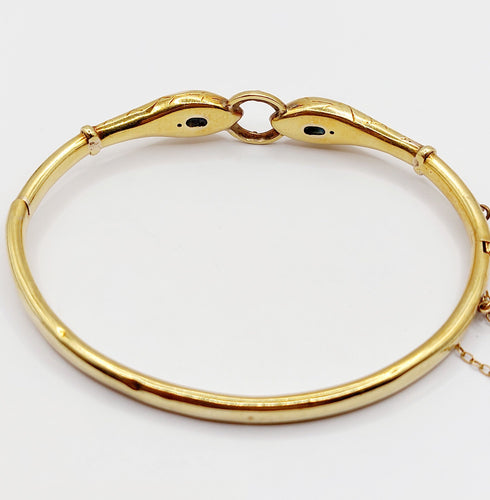 Bracelet Bracelet serpent à deux têtes or jaune et pierre bleues (circa 1920) 58 Facettes A06347