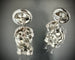 Boucles d'oreilles Paire de boucles or blanc, deux diamants 0.51 et 0.55 carat 58 Facettes
