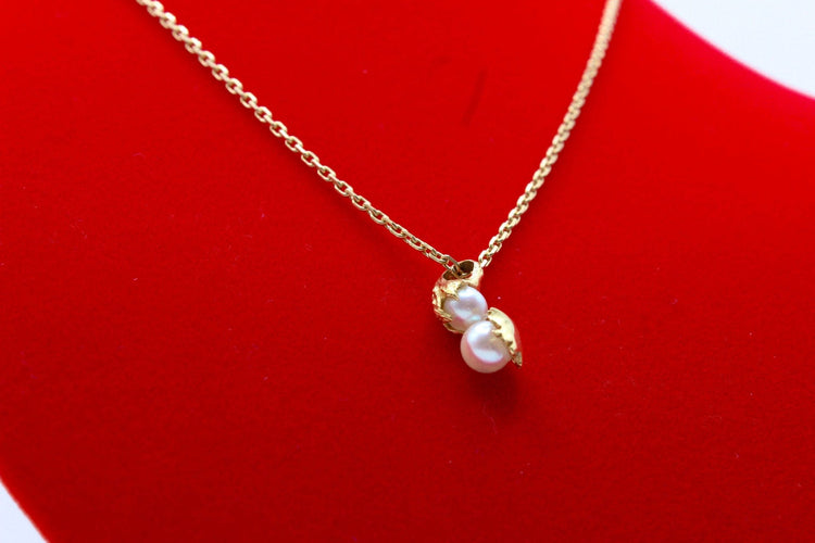 Pendentif Pendentif moderne or jaune et perles 58 Facettes 240385