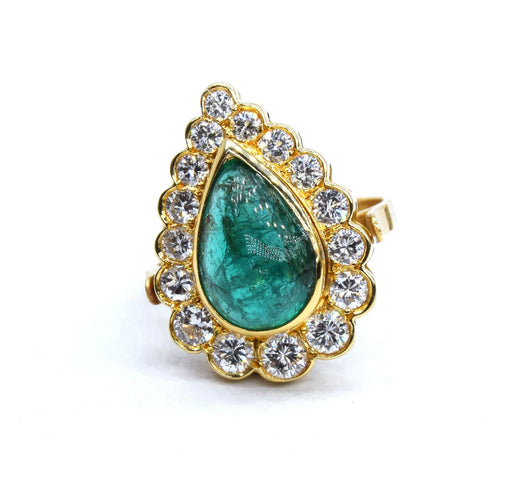 Bague Bague en or jaune avec émeraude 58 Facettes