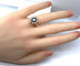 Bague 53 Bague marguerite en or blanc, saphir et diamants 58 Facettes AB644