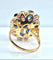 54 Importante bague or jaune, 7 saphirs et 6 rubis 58 Facettes AB454