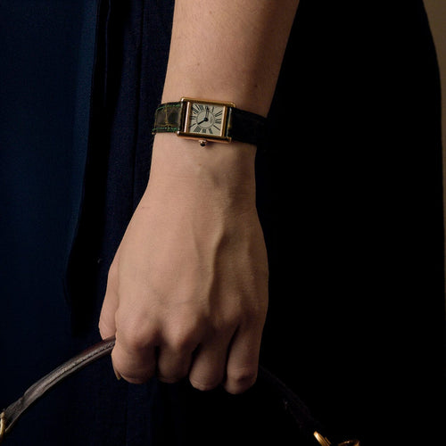 Montre Montre Cartier Modèle Tank Must en argent plaqué or cadran blanc chiffres romains 58 Facettes