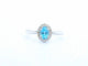 White gold ring with a blue topaz and natural diamonds 58 Facettes 2367