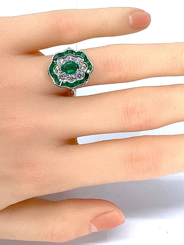 Bague Bague marguerite en or blanc 18 carats en émeraudes et diamants 58 Facettes AB216