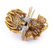 Broche Broche en or jaune et or blanc avec émeraudes et diamants 58 Facettes