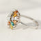 Vintage ring in white gold with colored and white diamonds 