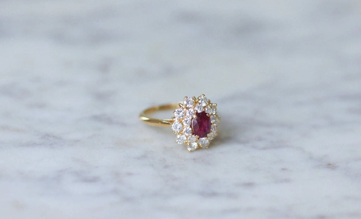 Bague Bague marguerite rubis entourage diamants 58 Facettes