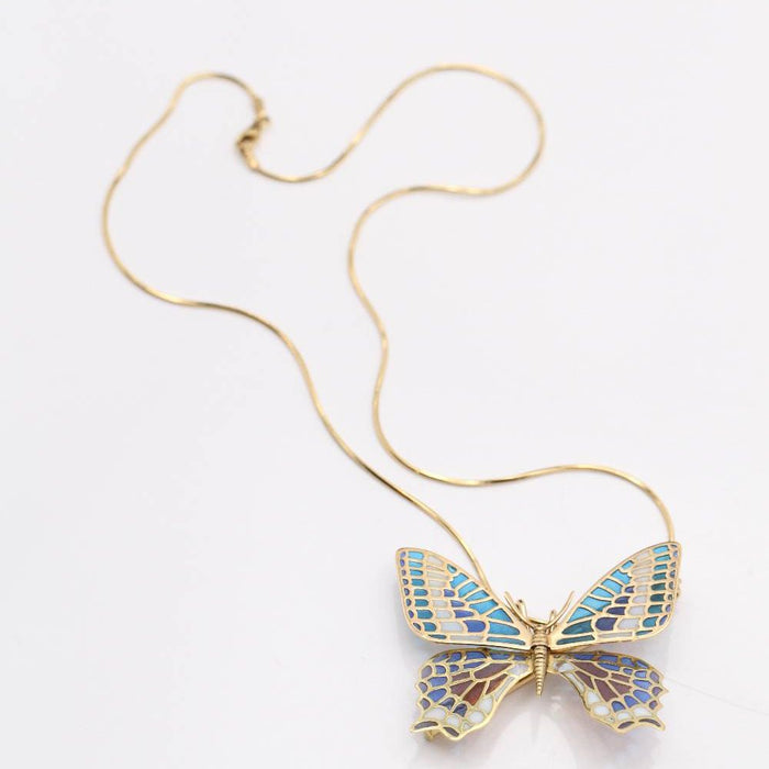 Butterfly in gold and enamel. Dual function