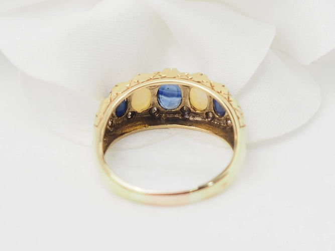 Bague 56.5 Bague jarretière en or jaune, saphirs et pierres de lune 58 Facettes 33246