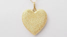 Pendentif Pendentif Coeur sablé de Carolina BUCCI en or jaune 58 Facettes 32863