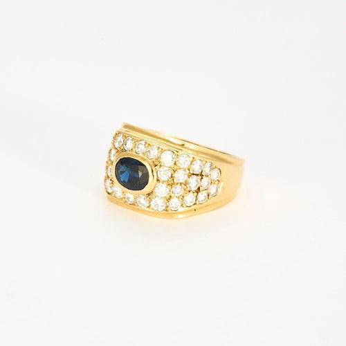 Bague 57 Bague or jaune, saphir central, sertie de 38 diamants 58 Facettes 1-0000102/2