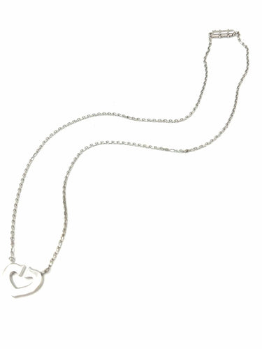 Collier CARTIER. Collection "Cœur et symbole", collier or blanc 18K 58 Facettes