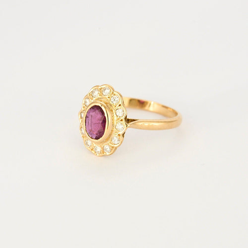 Bague 57 Bague marguerite or jaune, rubis et diamants 58 Facettes