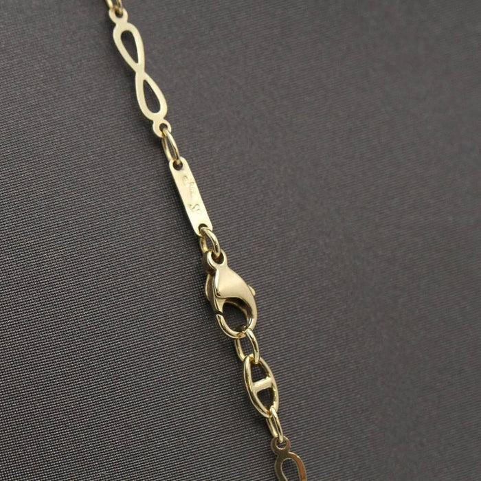 Collier chaîne infinie en or jaune 58 Facettes D363730