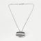 Collier CHAUMET - Chaîne en or blanc et pendentif en or blanc, diamants et émail noir 58 Facettes 250359