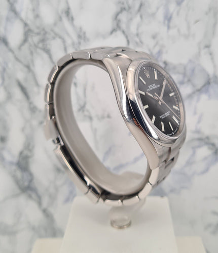 Montre Rolex - Montre Oyster Perpetual 39 Black 58 Facettes 114300-2-1