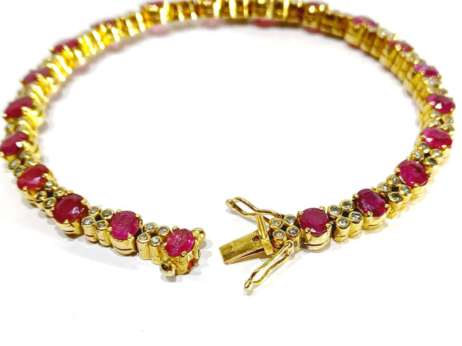Pulsera de oro amarillo con diamantes rubí