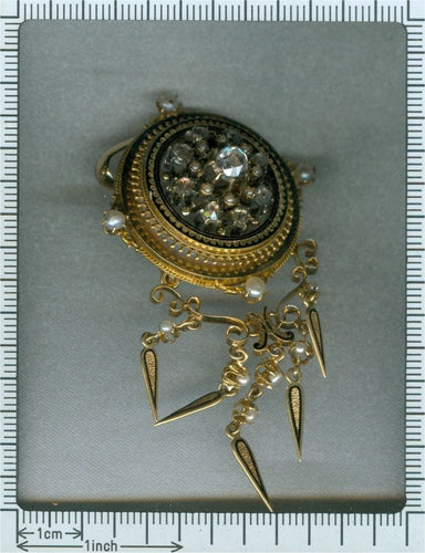 Pendentif Polyvalence victorienne : le double charme d'une broche-pendentif des années 1860 58 Facettes 17086-0044