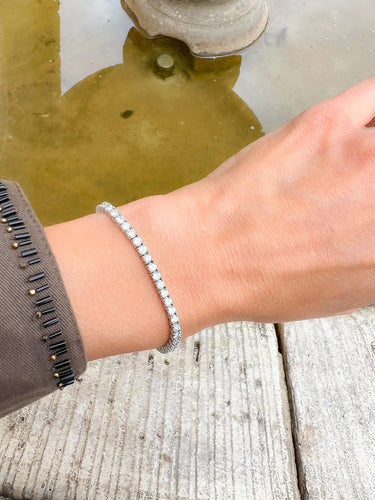 Bracelet Rivière en Or gris orné de diamant 58 Facettes 0