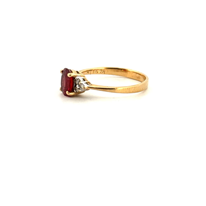 Yellow gold ruby and diamond ring