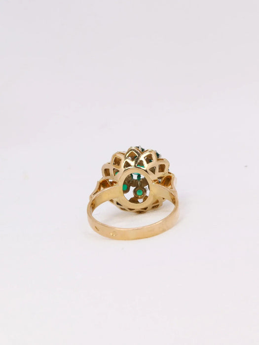 Yellow gold star ring with green stone