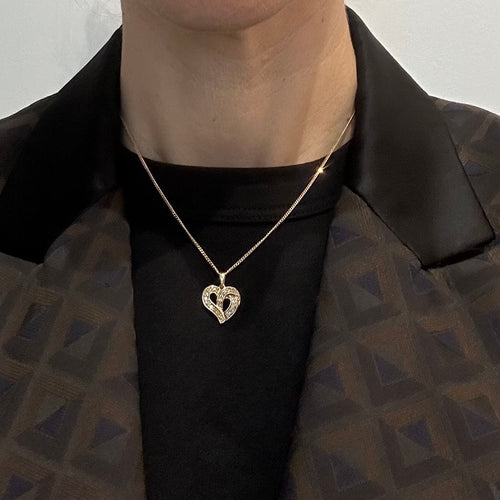 Pendentif Pendentif cœur en or jaune et diamants 58 Facettes Z15B51614