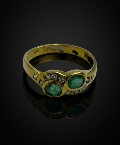 Bague Bague sinueuse ornée d'émeraudes et de diamants 58 Facettes