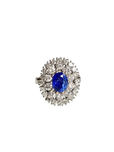 Bague 57 Bague Marguerite en or blanc, saphir et diamants 58 Facettes