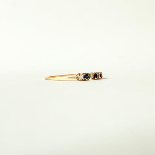 Half-eternity ring Gold, sapphires, and diamonds 