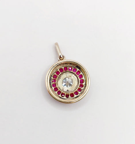Pendentif Pendentif cible art deco or jaune 18k diamant taille ancienne et rubis (circa 1920) 58 Facettes A05894